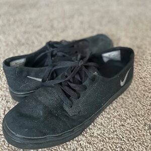 Nike Black Low-Top Canvas Sneakers with Silver Swoosh